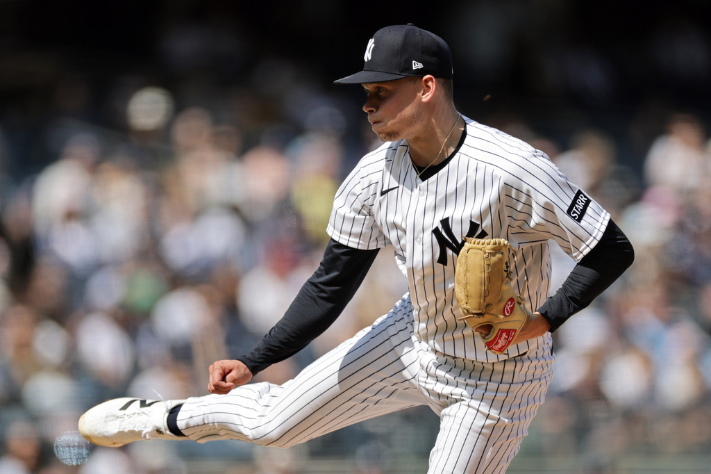 New York Yankees pitcher Will Warren throws during the fifth inning of a baseball game against the Kansas City Royals, Saturday, April 18, 2026, in New York. (AP Photo/Adam Hunger)