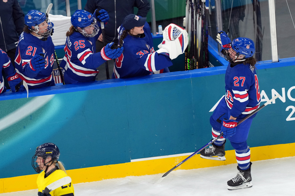 United States' Taylor Heise (27) celebrates after scoring a goal against Sweden during the second period of a women's ice hockey semifinal match at the 2026 Winter Olympics, in Milan, Italy, Monday, Feb. 16, 2026. (AP Photo/Carolyn Kaster)