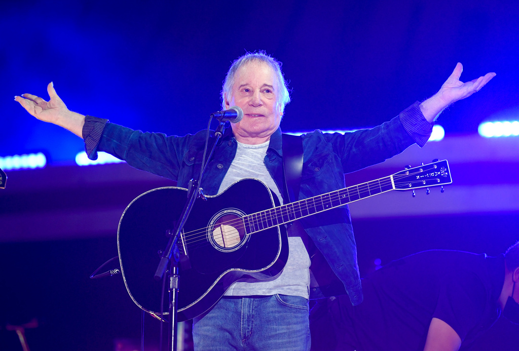 FILE - Singer-songwriter Paul Simon performs at Global Citizen Live in Central Park on Sept. 25, 2021, in New York. (Photo by Evan Agostini/Invision/AP, File)