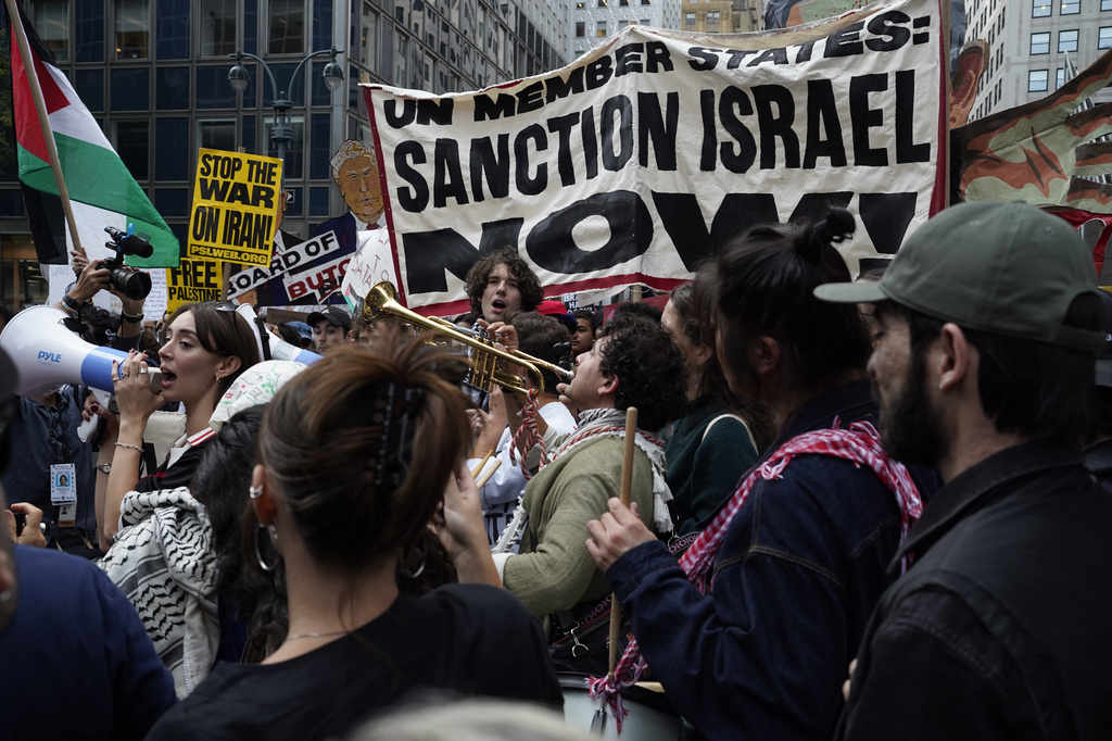 Demonstrators gather to protest following Israeli Prime Minister Benjamin Netanyahu's address at the 81st session of the United Nations General Assembly, Thursday, Sept. 24, 2026, in New York. (AP Photo/Madison Swart)