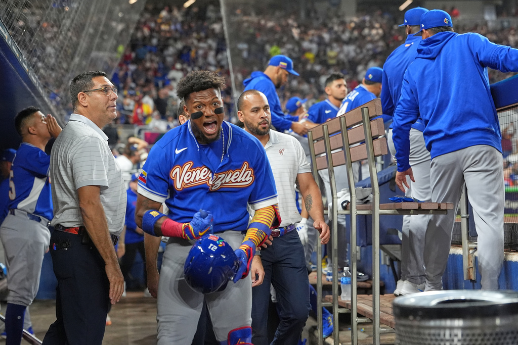 Venezuela's Ronald Acuna Jr. celebrates his single home run during the first inning of a World Baseball Classic quarterfinal game, Saturday, March 14, 2026, in Miami. (AP Photo/Lynne Sladky)