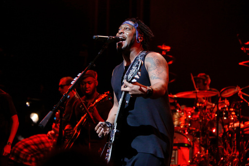 FILE - D' Angelo and the Vanguard perform at the Apollo Theatre in New York on Feb. 7, 2015. (Photo by Mark Von Holden/Invision/AP, File) FILE - D' Angelo and the Vanguard perform at the Apollo Theatre in New York on Feb. 7, 2015. (Photo by Mark Von Holden/Invision/AP, File)