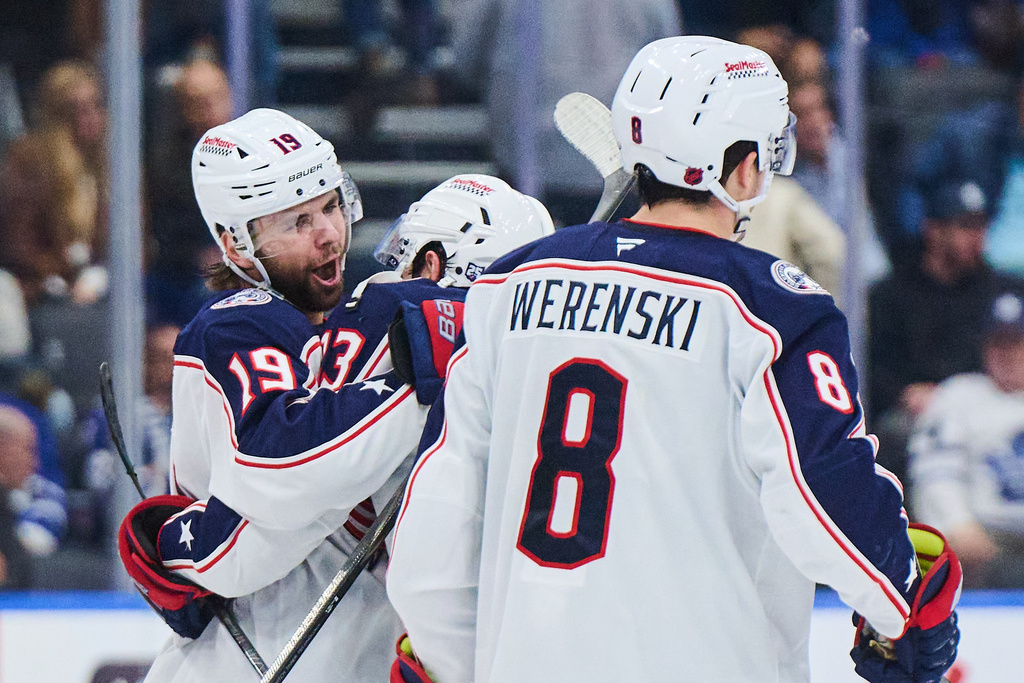 Columbus Blue Jackets' Adam Fantilli (19) celebrates his game-winning goal against the Toronto Maple Leafs in overtime NHL hockey action in Toronto, on Thursday, Nov. 20, 2025. (Sammy Kogan/The Canadian Press via AP)