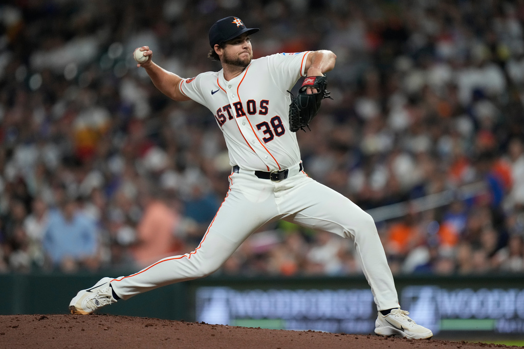 Houston Astros starting pitcher Peter Lambert throws during the third inning of a baseball game against the Los Angeles Dodgers in Houston, Tuesday, May 5, 2026. (AP Photo/Ashley Landis)