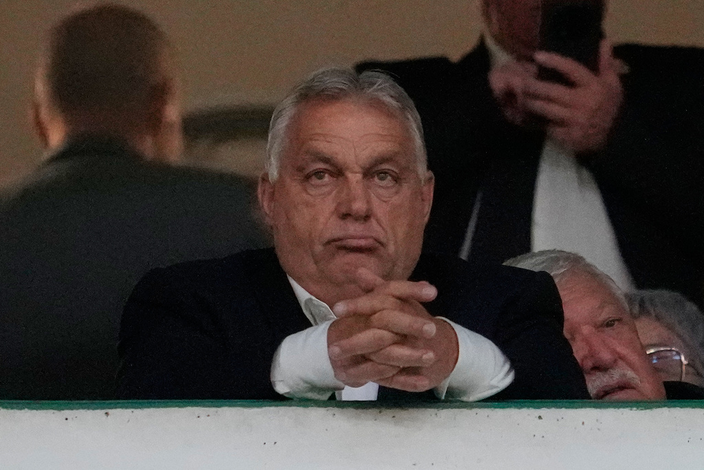Hungarian Prime Minister Viktor Orban watches a World Cup 2026 group F qualifying soccer match between Portugal and Hungary in Lisbon, Tuesday, Oct. 14, 2025. (AP Photo/Armando Franca)