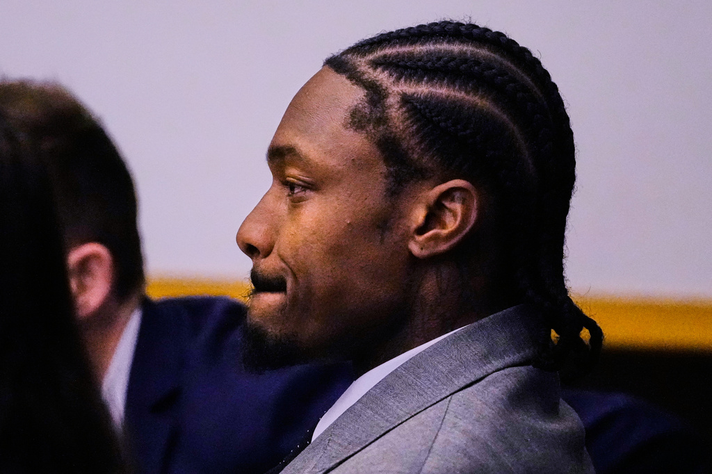 Former New England Patriots wide receiver Stefon Diggs reacts after a not guilty verdict at his trial at Norfolk County District Court, Tuesday, May 5, 2026, in Dedham, Mass. (AP Photo/Charles Krupa, Pool)