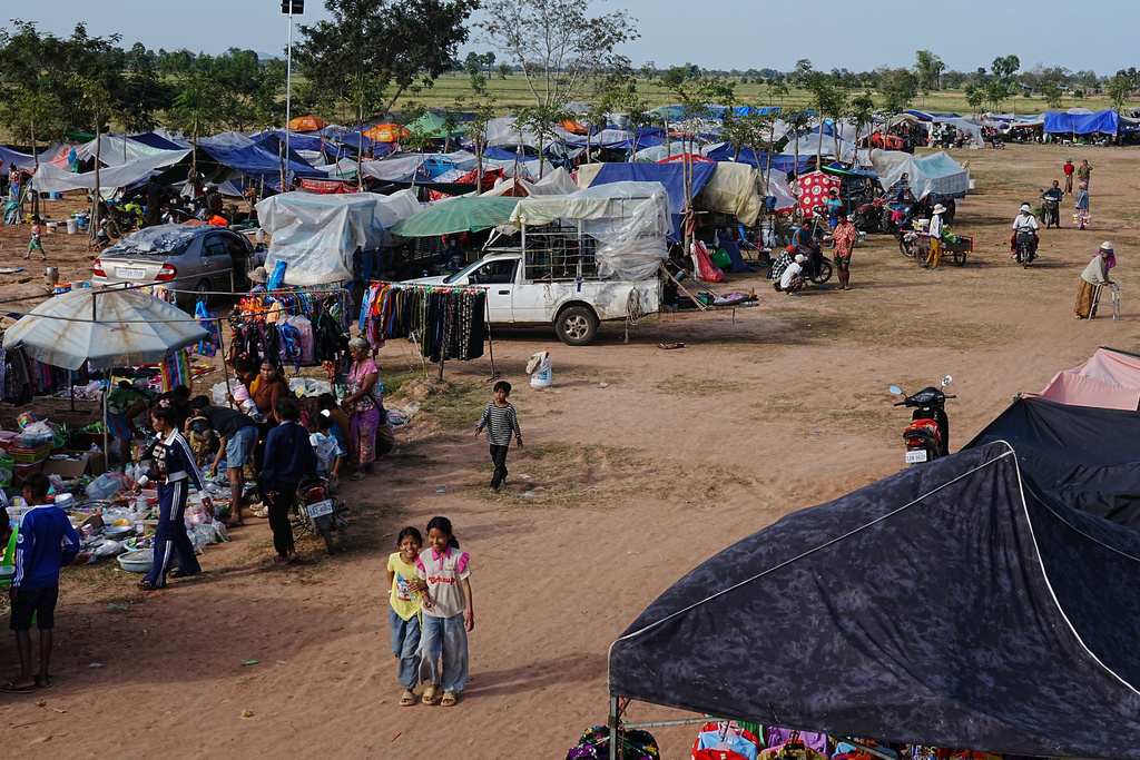 People take refuge in Wat Prasat Srahkandal, Banteay Menchey province, Cambodia Sunday, Dec. 14, 2025, after fleeing home following fighting along the Thailand-Cambodia border. (AP Photo/Heng Sinith)