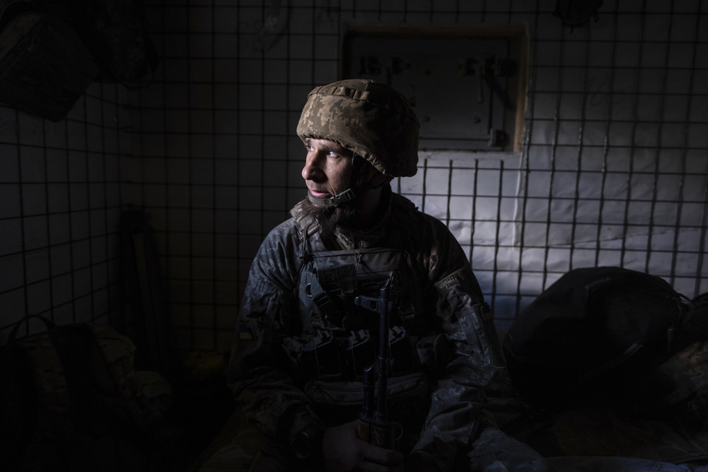 In this photo provided by Ukraine's 93rd Kholodnyi Yar Separate Mechanized Brigade press service, a soldier looks on in a shelter on the frontline near Kostyantynivka in Donetsk region, Ukraine, Tuesday, Aug. 26, 2025. (Iryna Rybakova/Ukraine's 93rd Mechanized Brigade via AP)