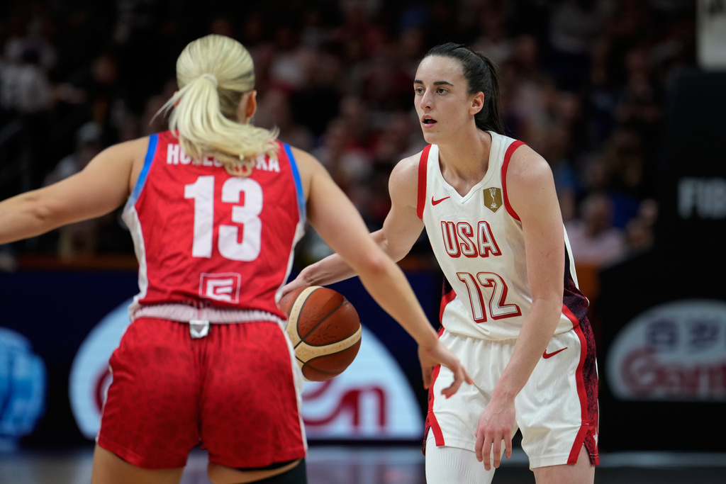 Czechia's Petra Holesinska guards Caitlin Clark, of the United States, during the Women's Basketball World Cup match between the United States and Czechia in Berlin, Monday, Sept. 7, 2026. (AP Photo/Ebrahim Noroozi)
