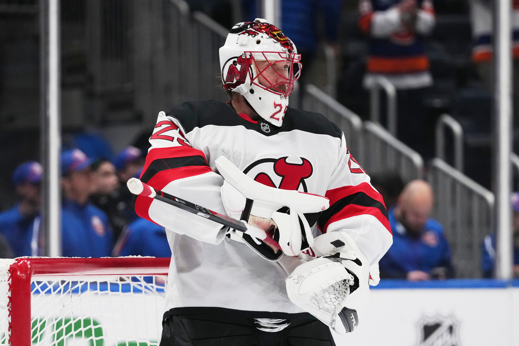 New Jersey Devils goaltender Jacob Markstrom (25) reacts after New York Islanders' Casey Cizikas (53) scored a goal during the third period of an NHL hockey game Tuesday, Jan. 6, 2026, in Elmont, N.Y. (AP Photo/Frank Franklin II)