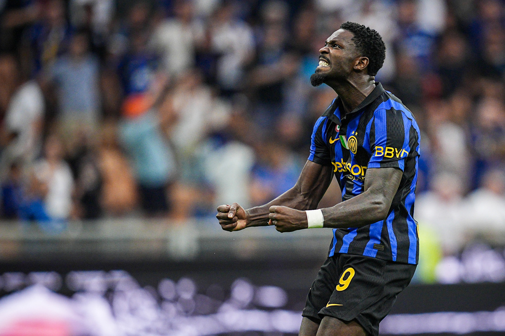 Inter's Marcus Thuram celebrates after scoring his team's second goal during the Serie A soccer match between Inter and Napoli at the San Siro Stadium in Milan, Italy, Saturday, Sept. 5, 2026. (Marco Alpozzi/LaPresse via AP)