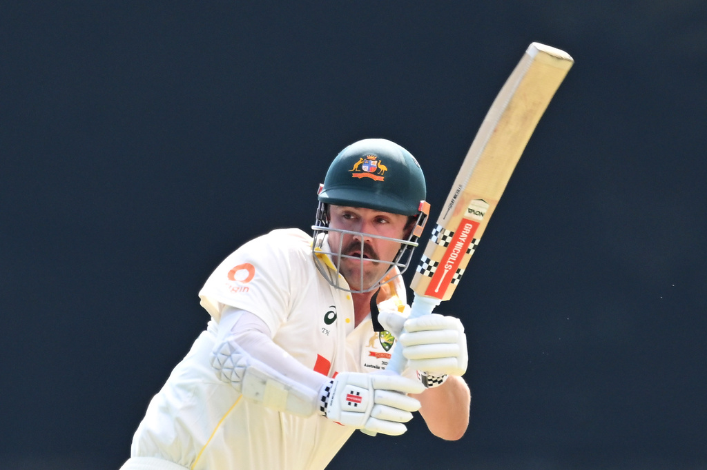 Australia's Travis Head bats against Bangladesh during their cricket test match in Darwin, Australia, Thursday, Aug. 13, 2026. (James Ross/AAP Image via AP)