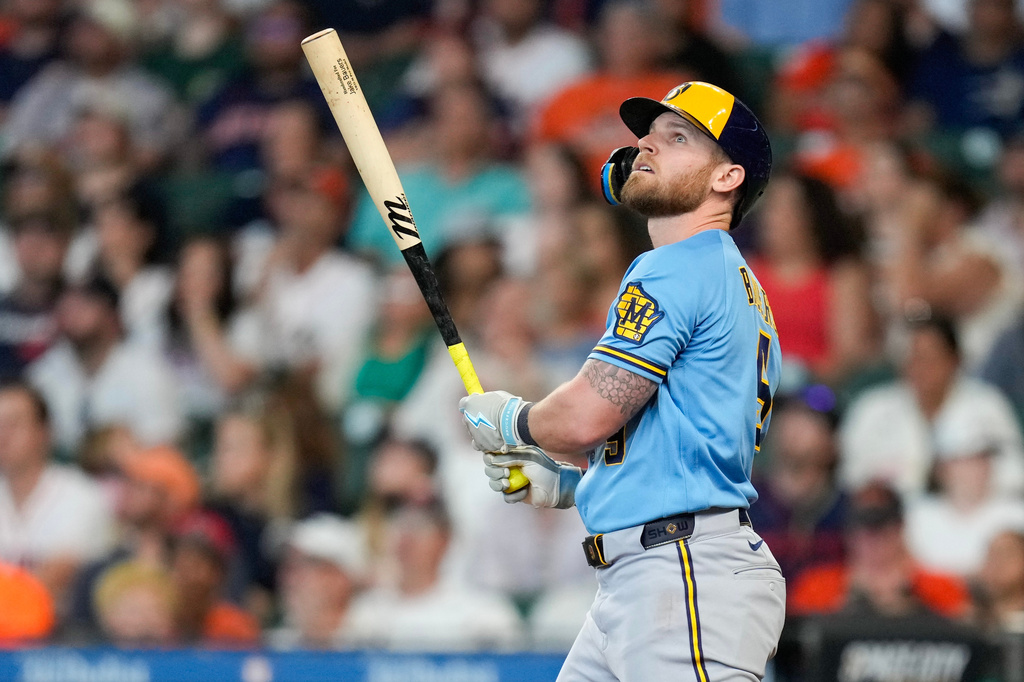 Milwaukee Brewers' Jake Bauers watches his two-run home run against the Houston Astros during the fourth inning of a baseball game, Sunday, May 31, 2026, in Houston. (AP Photo/Eric Christian Smith)