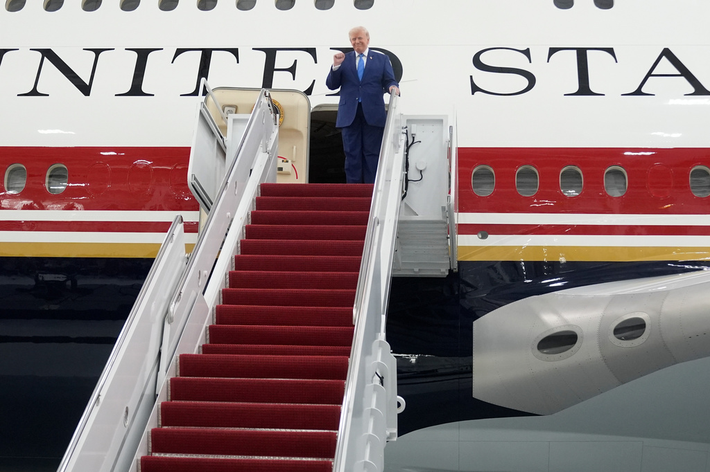 President Donald Trump exits the newly designated Air Force One presidential aircraft following a tour at Joint Base Andrews, Md., Friday, June 19, 2026. (AP Photo/Manuel Balce Ceneta)