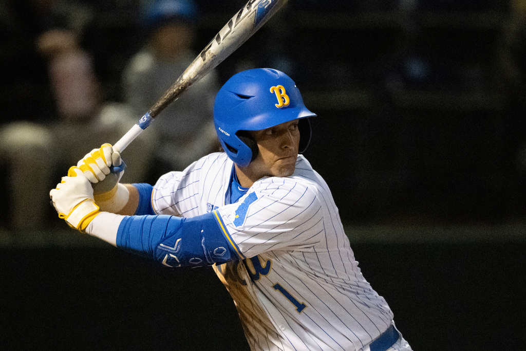 FILE - UCLA's Roch Cholowsky (1) bats during an NCAA baseball game against BYU on Feb. 18, 2025, in Los Angeles. (AP Photo/Kyusung Gong, File)