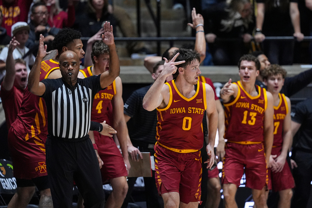 Iowa State guard Nate Heise (0) celebrates a three-point basket against Purdue during the second half of an NCAA college basketball game in West Lafayette, Ind., Saturday, Dec. 6, 2025. (AP Photo/Michael Conroy)