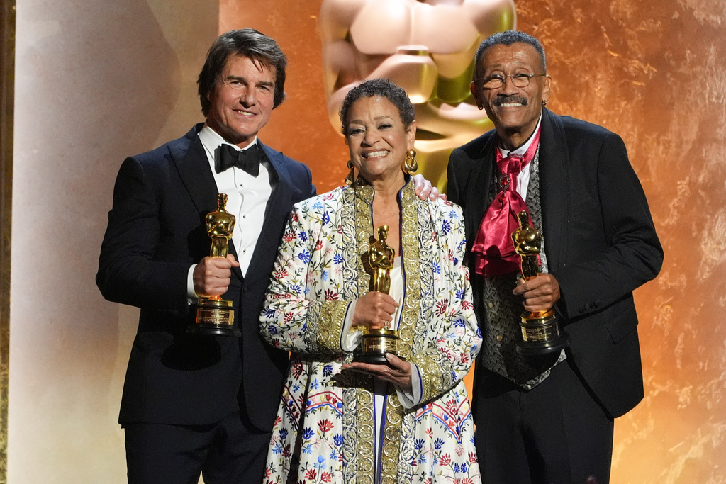 Tom Cruise, from left, Debbie Allen, and Wynn Thomas, winners of Academy honorary awards pose onstage during the 16th Governors Awards on Sunday, Nov. 16, 2025, at The Ray Dolby Ballroom in Los Angeles. (AP Photo/Chris Pizzello)