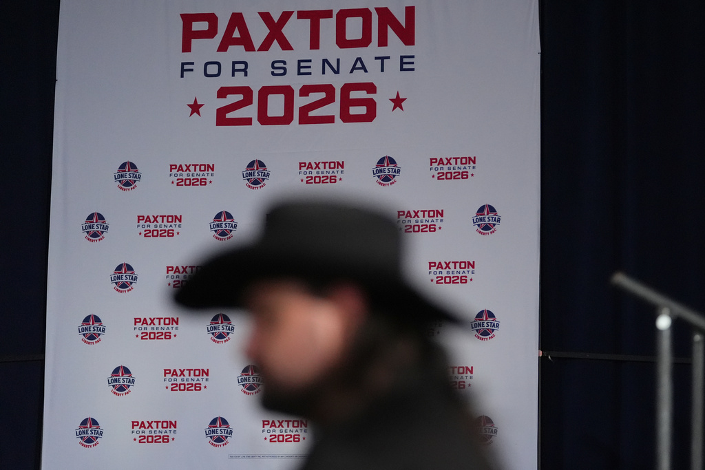 An attendee waits for the festivities at a primary night election watch party for Texas Attorney General Ken Paxton, a Republican candidate for the U.S. Senate, on Tuesday, March 3, 2026, in Dallas. (AP Photo/Julio Cortez)