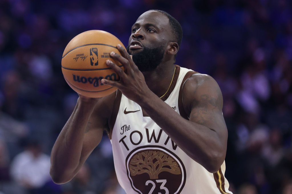 FILE - Golden State Warriors forward Draymond Green (23) shoots a free throw during the second half of an NBA basketball game against the Sacramento Kings on April 10, 2026, in Sacramento, Calif. (AP Photo/Scott Marshall, File)