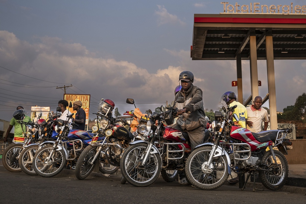 Motorcycle taxi drivers wait for customers in Blantyre, Malawi, Tuesday, Sept. 16, 2025. (AP Photo/Thoko Chikondi)