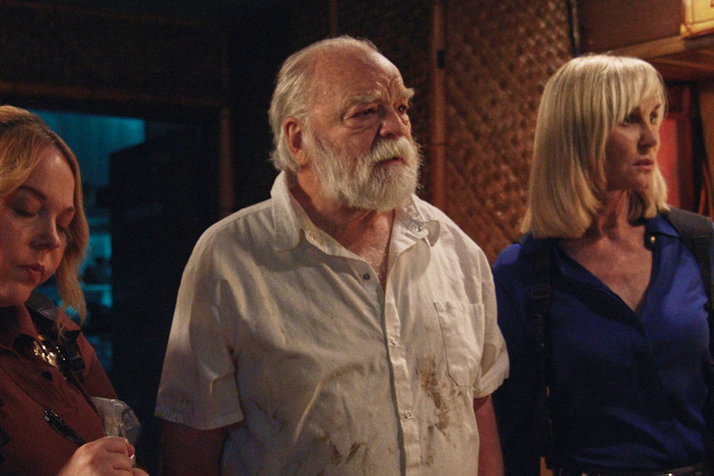 This image released by Multicom Entertainment Group, Inc. shows Richard Riehle, center, during the filming of "The Cowboy Killer." (Ben Solenberger/ Multicom Entertainment Group, Inc. via AP)