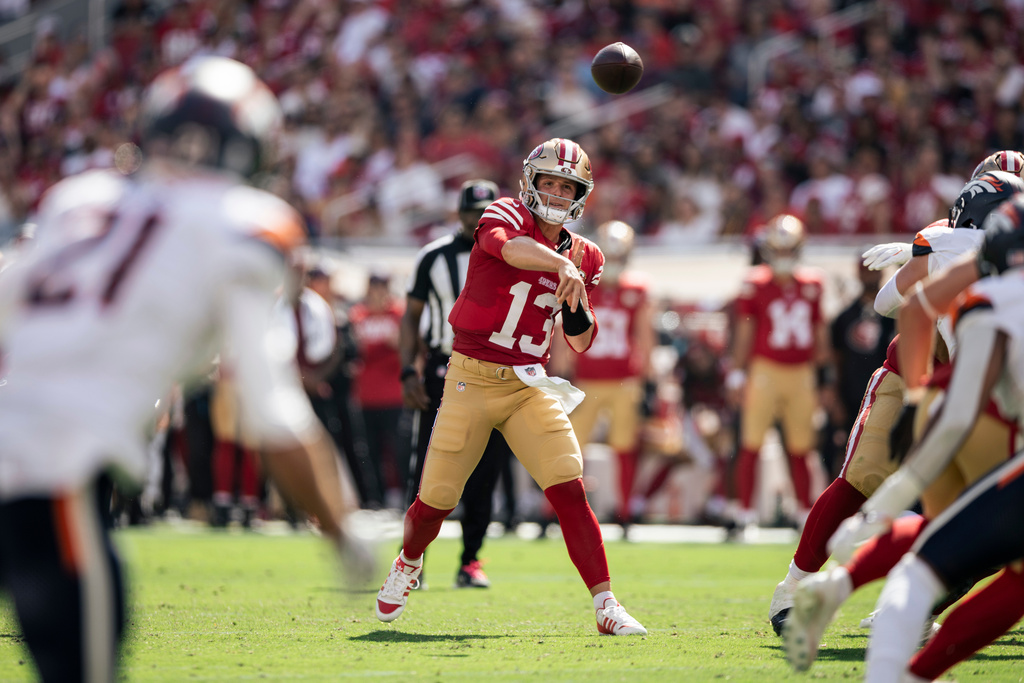 San Francisco 49ers quarterback Brock Purdy (13) throws a pass during the first half of an NFL football game against the Denver Broncos in Santa Clara, Calif., Sunday, Oct. 4, 2026. (Stephen Lam/San Francisco Chronicle via AP)