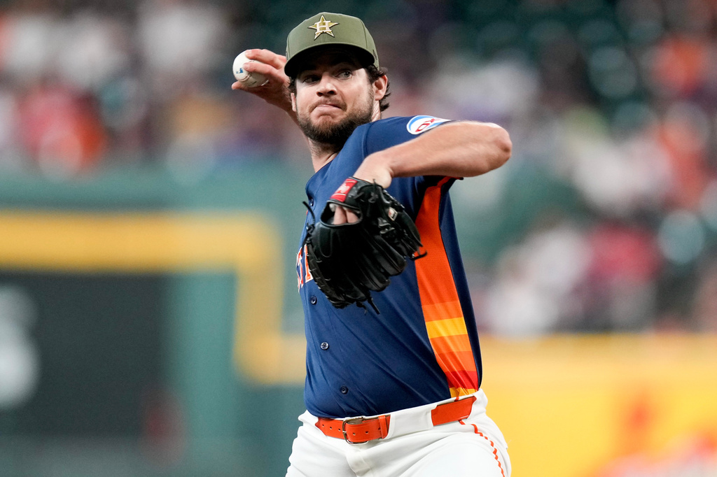Houston Astros starting pitcher Peter Lambert throws against the Texas Rangers during the first inning of a baseball game, Sunday, May 17, 2026, in Houston. (AP Photo/Eric Christian Smith)