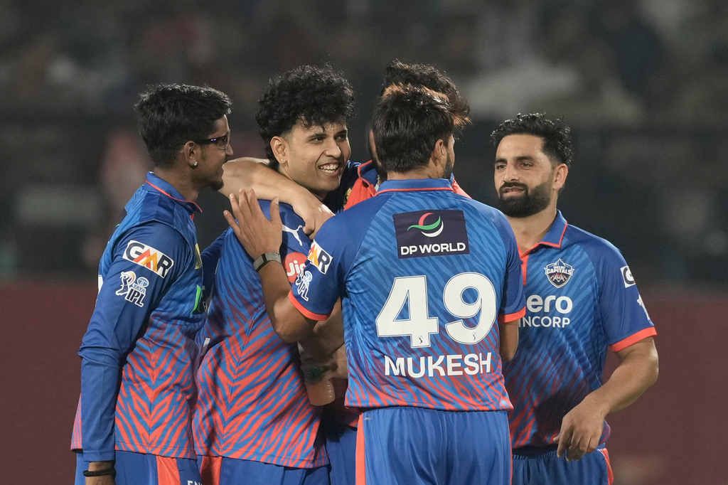 Delhi Capitals' Madhav Tiwari, second left, celebrates the wicket of Punjab Kings' Priyansh Arya with teammates during the Indian Premier League cricket match between Delhi Capitals and Punjab Kings in Dharamshala, India, Monday, May 11, 2026. (AP Photo/Ashwini Bhatia)