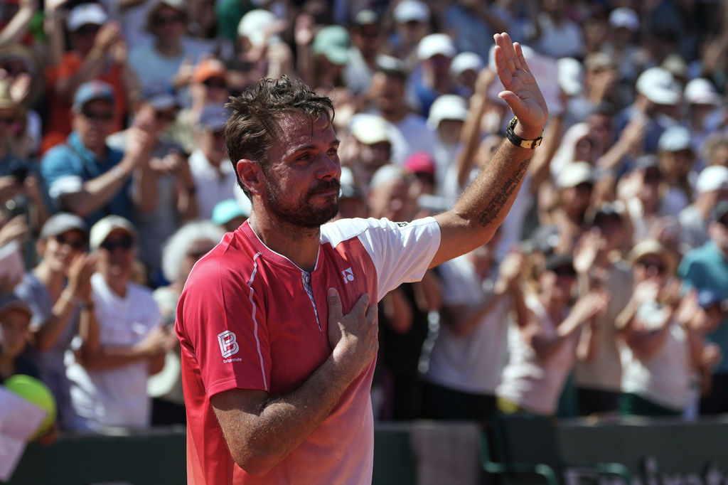 Stan Wawrinka of Switzerland reacts after the first round men's singles tennis match against Jesper De Jong of the Netherlands at the French Open tennis tournament in Paris, Monday, May 25, 2026. (AP Photo/Thibault Camus)