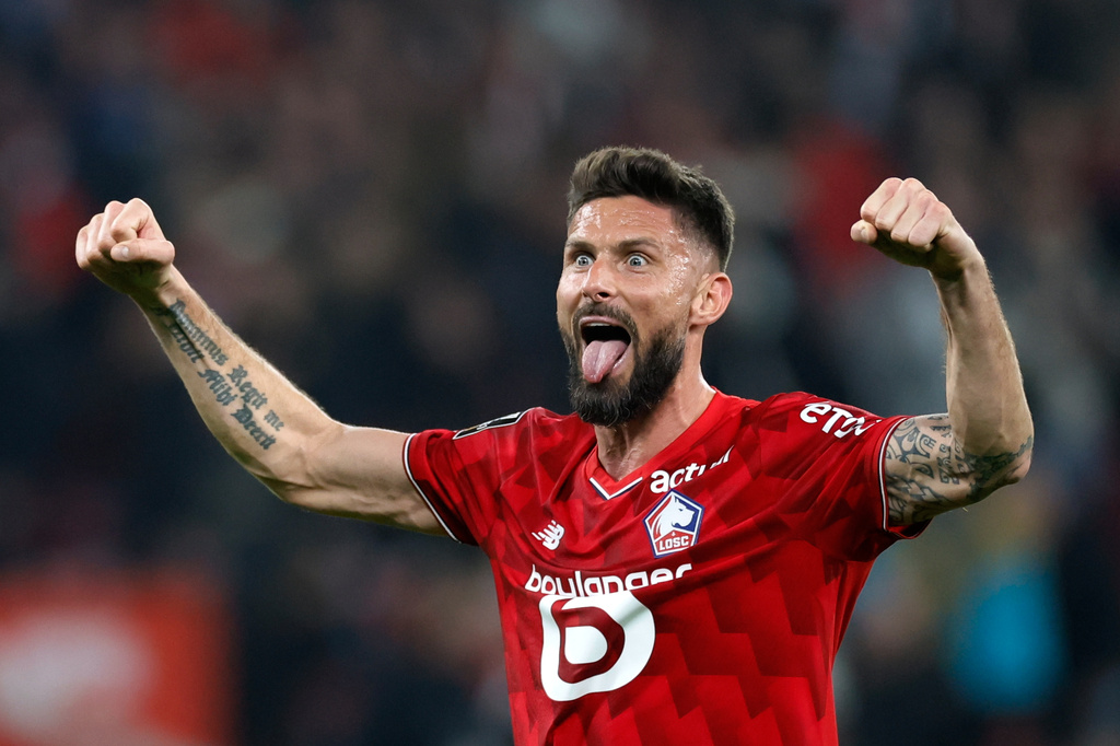 Lille's Olivier Giroud celebrates at the end of the French League One soccer match between Lille and Lens, in Lille, France, Saturday, April 4, 2026. (AP Photo/Jean-Francois Badias)