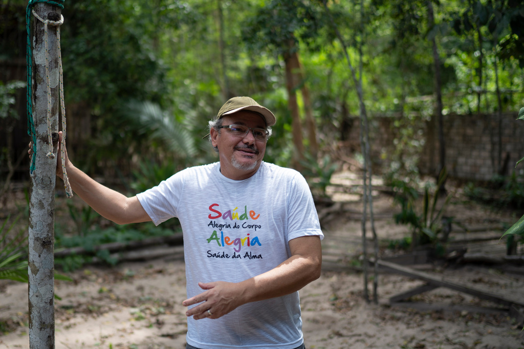 FILE - Caetano Scannavino, coordinator of NGO Saude e Alegria translated to Health and Happiness, speaks during an interview outside his home in Alter do Chao, Para state, Brazil on Dec. 1, 2019. (AP Photo/Leo Correa, File)