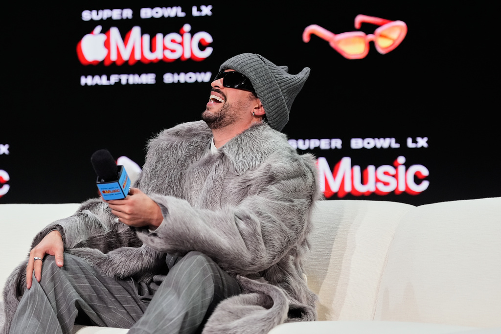 Apple Music Super Bowl LX Halftime Show performer Bad Bunny laughs during a news conference, Thursday, Feb. 5, 2026, in San Francisco ahead of the NFL Super Bowl 60 football game between the Seattle Seahawks and the New England Patriots. (AP Photo/Godofredo A. Vásquez)