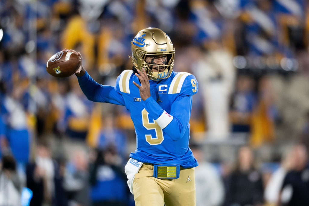 UCLA quarterback Nico Iamaleava throws a pass during the first half of an NCAA college football game against Washington, Saturday, Nov. 22, 2025, in Pasadena, Calif. (AP Photo/Kyusung Gong)