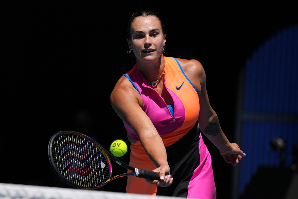 Aryna Sabalenka of Belarus plays a forehand return to Iva Jovic of the U.S. during their quarterfinal match at the Australian Open tennis championship in Melbourne, Australia, Tuesday, Jan. 27, 2026. (AP Photo/Dar Yasin)