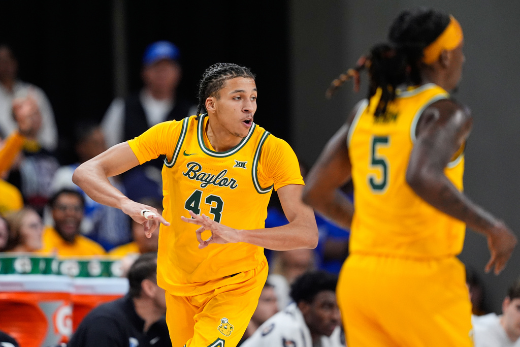 Baylor guard Cameron Carr celebrates after sinking a three-pointer in the first half of an NCAA college basketball game againts BYU Tuesday, Feb. 10, 2026, in Waco, Texas. (AP Photo/Tony Gutierrez)