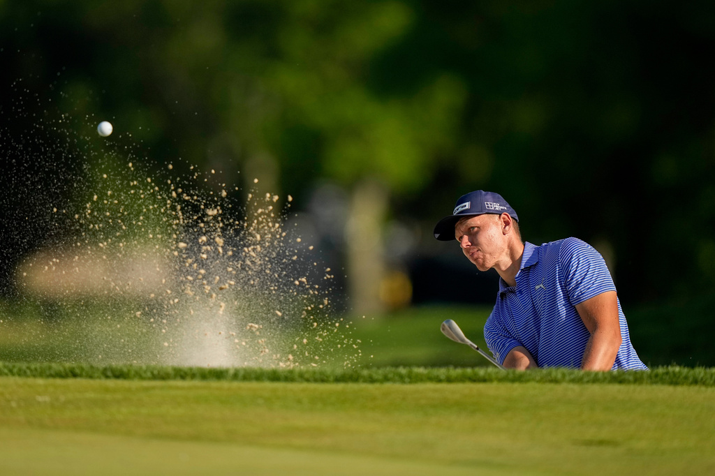 Matti Schmid, of Germany, hits from the bunker on the 13th green during the final round of the PGA Championship golf tournament at Aronimink Golf Club, Sunday, May 17, 2026, in Newtown Square, PA. (AP Photo/Frank Franklin II)