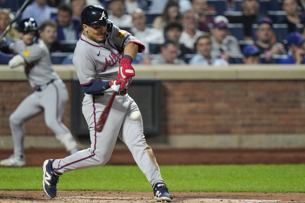 Atlanta Braves' Nacho Alvarez Jr. hits a two-run double during the fourth inning of a baseball game against the New York Mets Tuesday, Aug. 12, 2025, in New York. (AP Photo/Frank Franklin II)