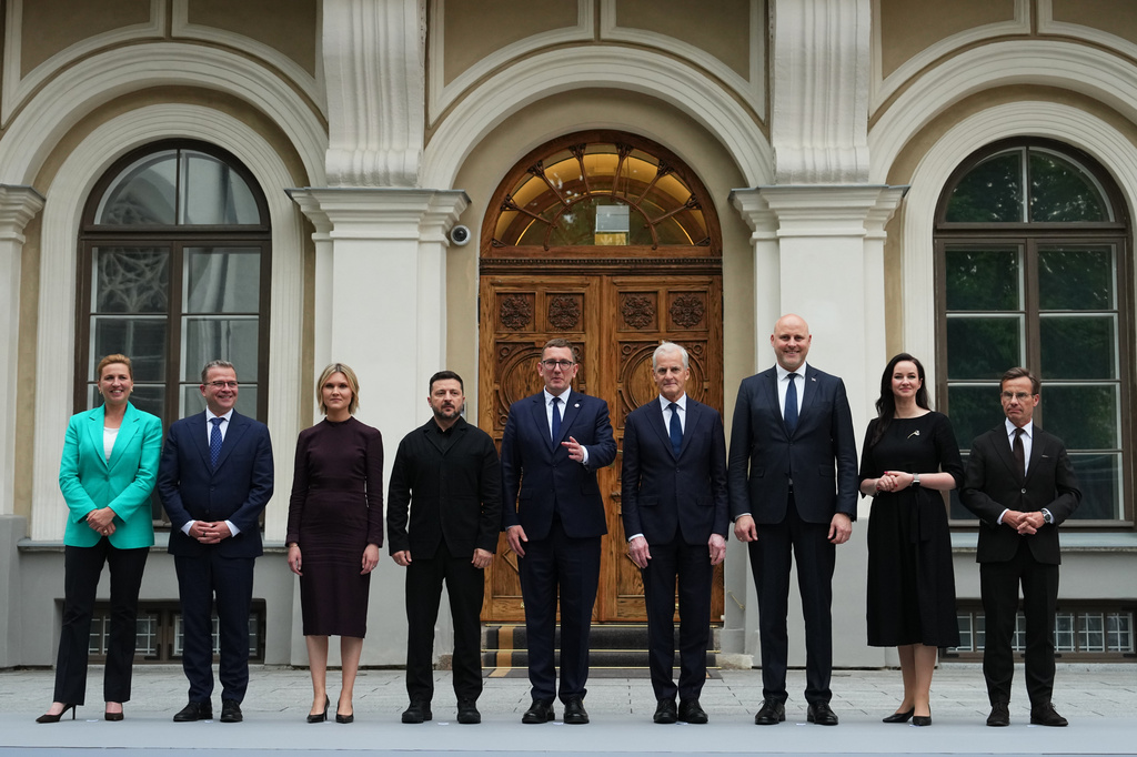 Danish Prime Minister Mette Frederiksen, Finnish Prime Minister Petteri Orpo, Iceland's Prime Minister Kristrun Mjoll Frostadottir, Ukraine's President Volodymyr Zelenskyy, Estonia's Prime Minister Kristen Michal, Norwegian Prime Minister Jonas Gahr Store, Latvia's Prime Minister Andris Kulbergs, Lithuania's Prime Minister Inga Ruginiene and Sweden's Prime Minister Ulf Kristersson, from left, attend a Nordic and Baltic countries meeting in Tallinn, Estonia, Tuesday, June 9, 2026. (AP Photo/Sergei Grits)