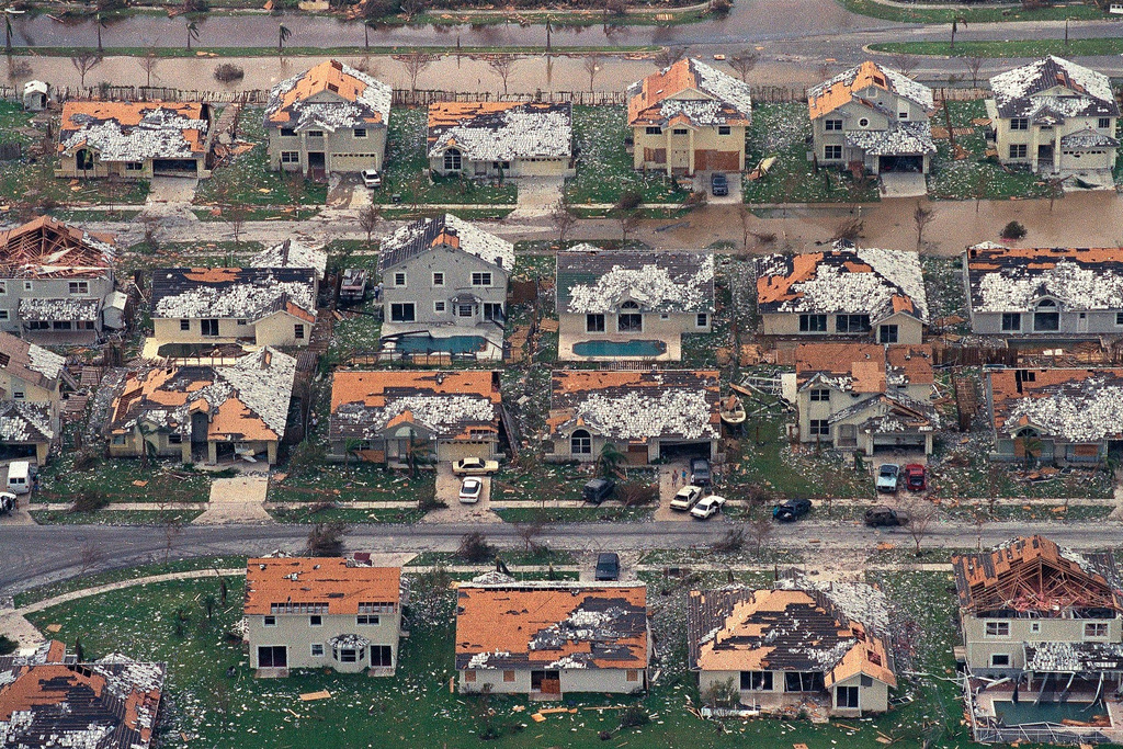 FILE - Rows of damaged houses sit between Homestead and Florida City, Fla., Aug. 25, 1992. (AP Photo/Mark Foley, File)