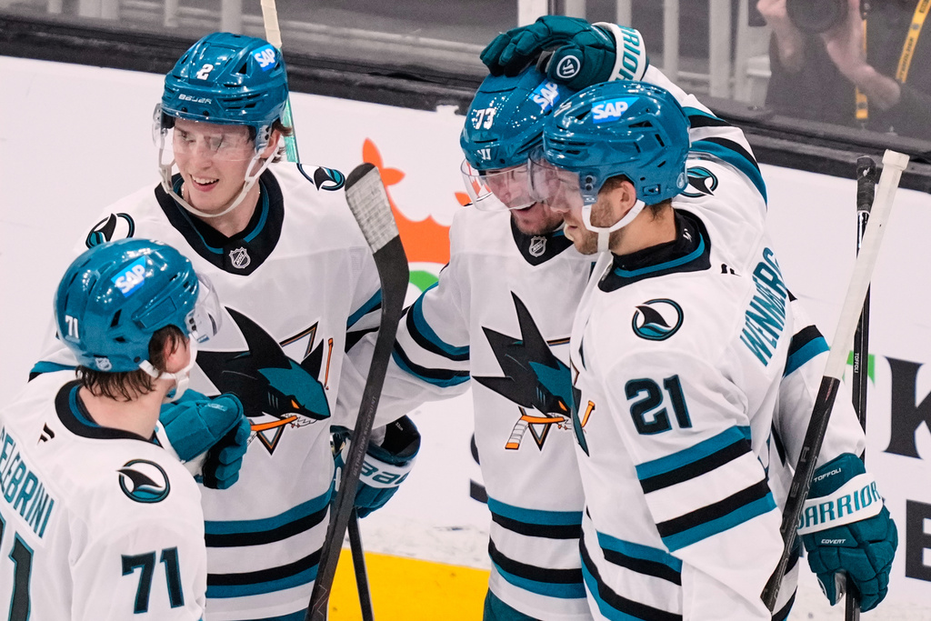 San Jose Sharks center Tyler Toffoli (73) is congratulated after his goal during the second period of an NHL hockey game against the Boston Bruins, Thursday, March 12, 2026, in Boston. (AP Photo/Charles Krupa)