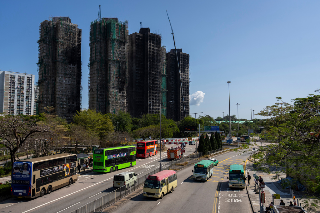 A general view of the fire-ravaged residential towers of the Wang Fuk Court apartment complex, in the Tai Po district of Hong Kong, Feb. 6, 2026. (AP Photo/Chan Long Hei)