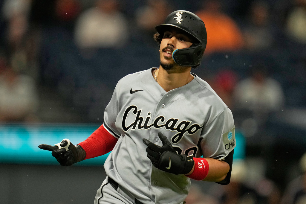 Chicago White Sox's Miguel Vargas gestures towards the dugout as he runs the bases with a home run in the fifth inning of a baseball game against the Cleveland Guardians in Cleveland, Friday, July 3, 2026. (AP Photo/Sue Ogrocki)