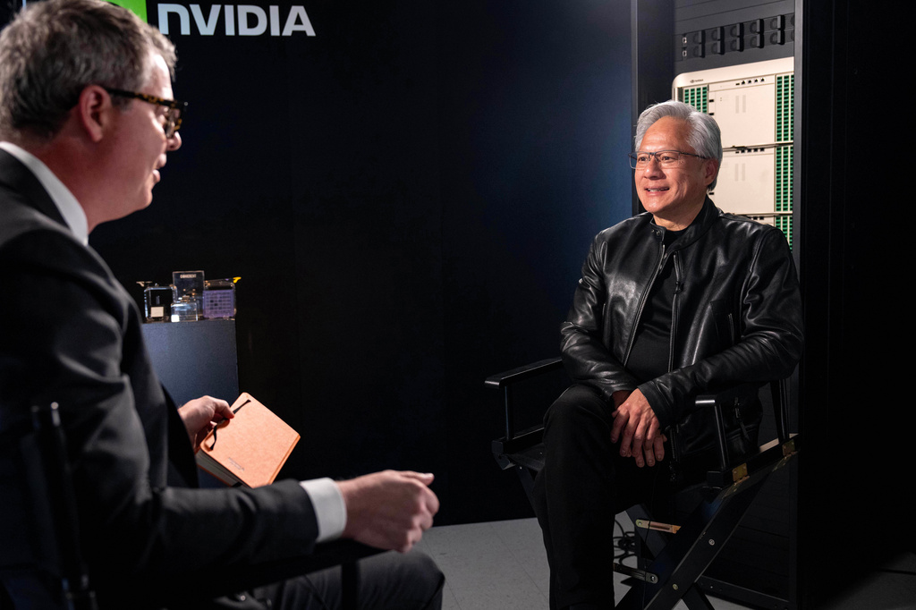 Jensen Huang, president and CEO of Nvidia, listens during an interview before a groundbreaking ceremony for an expansion of Coherent's manufacturing facility on Tuesday, June 16, 2026, in Sherman, Texas. (AP Photo/Jeffrey McWhorter)