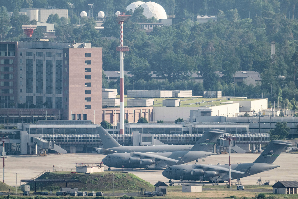 FILE -United States' Air Force transport aircrafts are seen on the tarmac at Ramstein US air base, in Landstuhl, Germany, June 23, 2025. (Boris Roessler/dpa via AP, File)