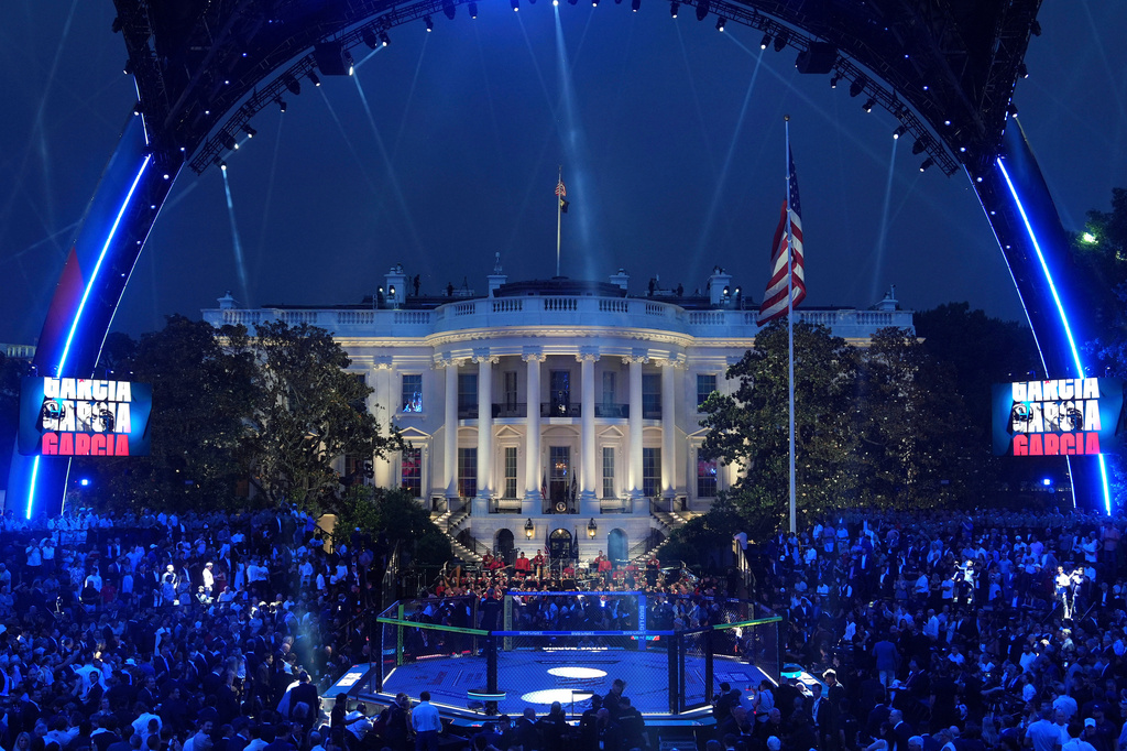 FILE - President Donald Trump arrives at the arena for the UFC Freedom 250 on the South Lawn of the White House, June 14, 2026, in Washington. (AP Photo/Mark Schiefelbein, File)