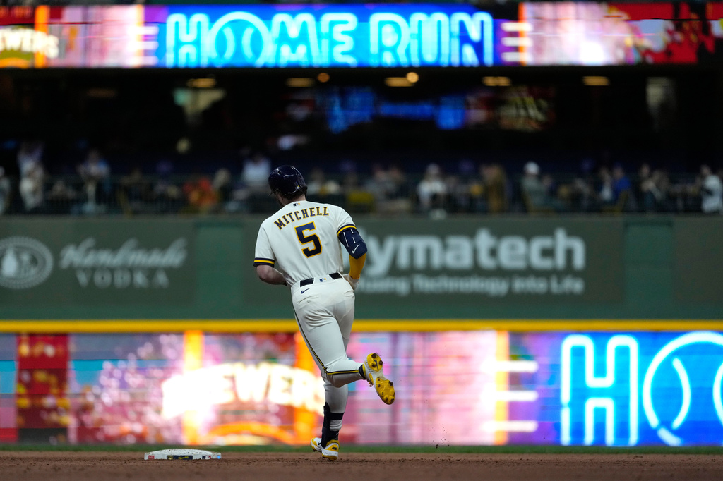Milwaukee Brewers' Garrett Mitchell rounds the bases after hitting a solo home run during the seventh inning of a baseball game against the Cleveland Guardians, Tuesday, June 16, 2026, in Milwaukee. (AP Photo/Aaron Gash)
