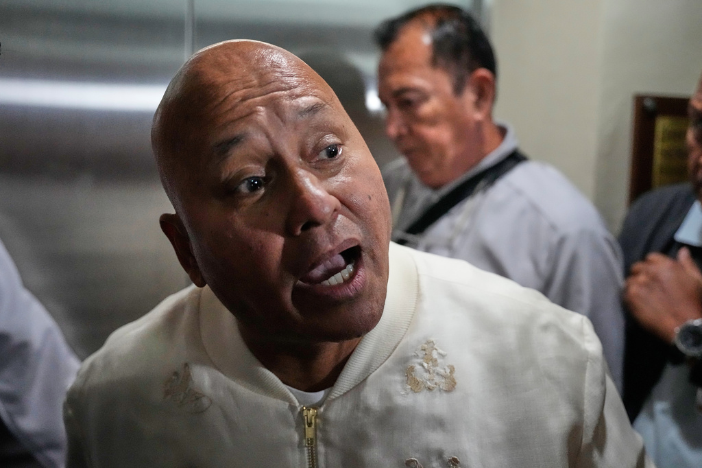 Philippine Senator Ronald dela Rosa speaks to reporters at the Philippine Senate in Pasay, Philippines on Tuesday, May 12, 2026. (AP Photo/Aaron Favila)