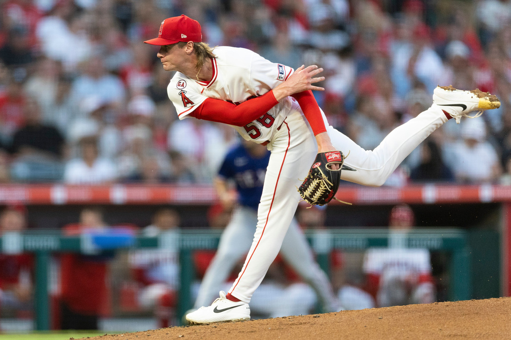 Los Angeles Angels starting pitcher George Klassen works against a Texas Rangers batter in the second inning of a baseball game Wednesday, Aug. 12, 2026, in Anaheim, Calif. (AP Photo/Karl Anderson)