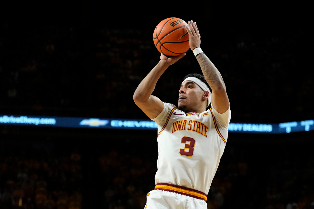 FILE - Iowa State guard Tamin Lipsey shoots during the second half of an NCAA college basketball game against Arizona State, March 7, 2026, in Ames, Iowa. (AP Photo/Charlie Neibergall, File)