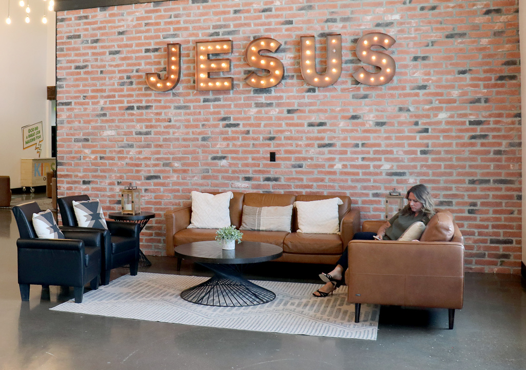 Pastor Sarah Lucas sits inside the Foundations for Nations church in Arapahoe, Wyo., on Monday, Aug. 17, 2026. (AP Photo/Savannah Peters)